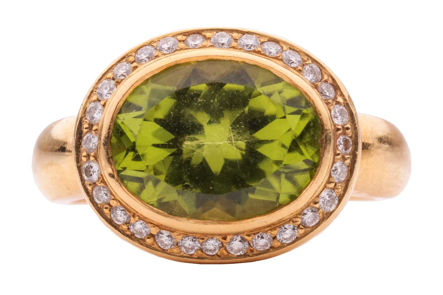 Lot 19 - A peridot and diamond cluster ring by Kiki...