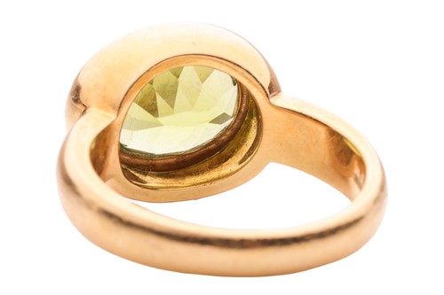 Lot 19 - A peridot and diamond cluster ring by Kiki...