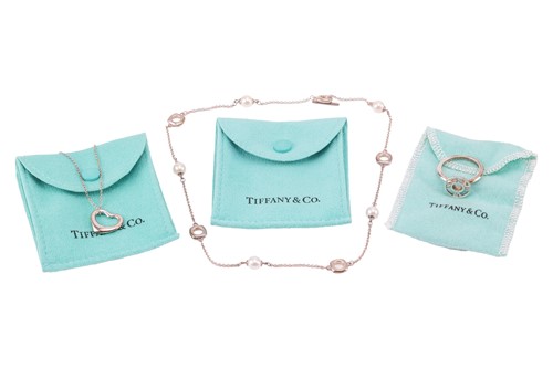 Lot 60 - Tiffany & Co. - a cultured pearl necklace, an '...
