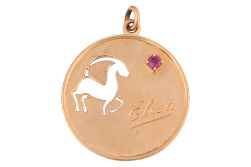 Lot 2 - A gazelle pendant, of circular form, pierced...