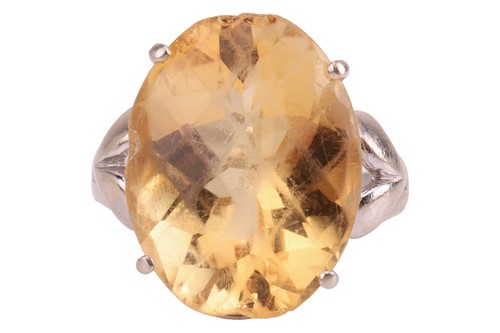 Lot 7 - A citrine cocktail ring, the oval chequerboard-...
