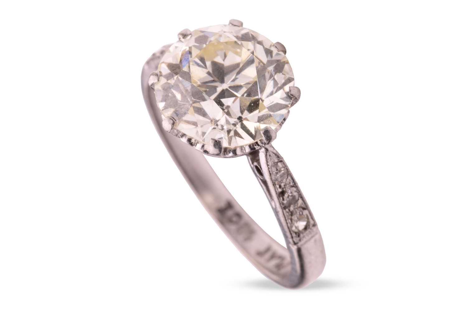Lot 103 - A diamond solitaire ring; comprising a...