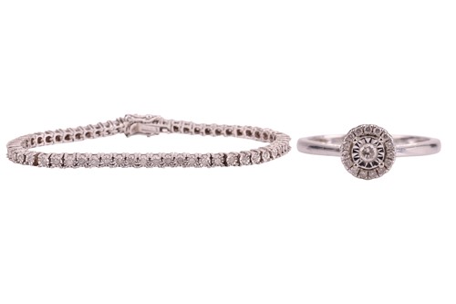 Lot 53 - A diamond halo ring together with a diamond...