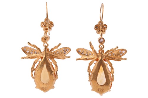 Lot 131 - A pair of bee pendant earrings set with...
