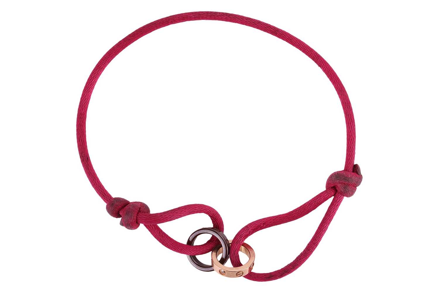 Lot 77 - Cartier - a 'Love Charity' bracelet, featuring...