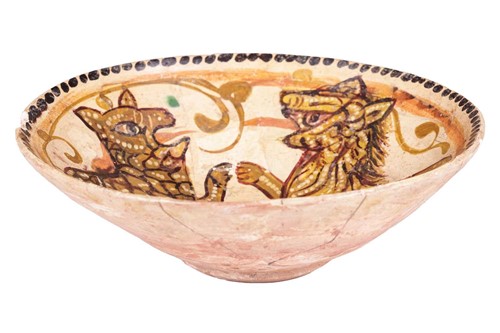 Lot 8 - A Persian Nishapur style circular pottery bowl,...