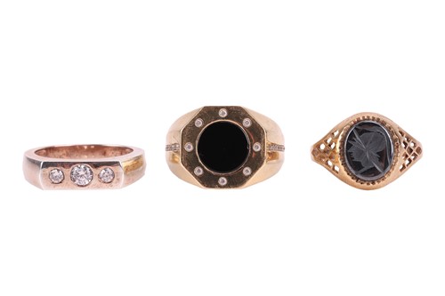 Lot Three gents rings; comprising a hematite...