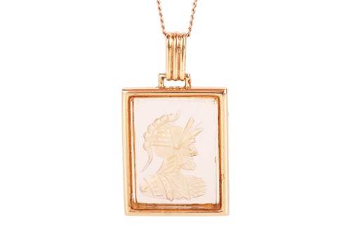 Lot A citrine intaglio pendant on chain, the...