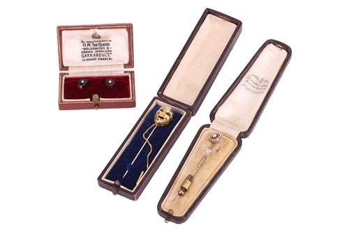 Lot 5 - A diamond set theatrical 'comedy' mask stick...