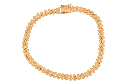Lot A fancy link bracelet, comprising a series of...