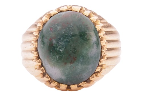 Lot An ocean jasper cabochon tartelette ring, the...