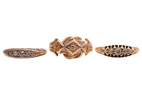 Lot Three rings; comprising a diamond-set...