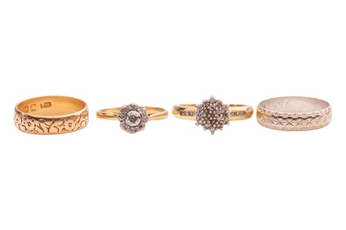 Lot Four rings; comprising a daisy-head...