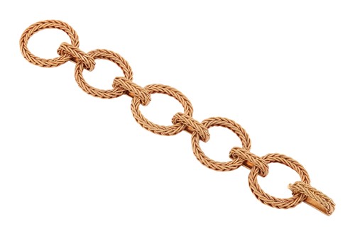 Lot 230 - Asprey & Co - A textured link bracelet in 18ct...