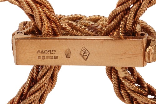 Lot 230 - Asprey & Co - A textured link bracelet in 18ct...