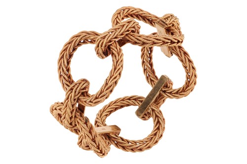 Lot 230 - Asprey & Co - A textured link bracelet in 18ct...