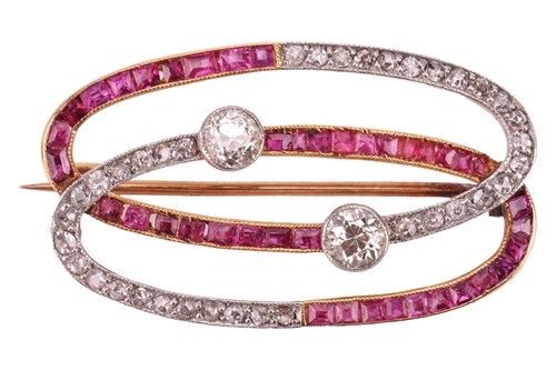 Lot An Art Deco ruby and diamond brooch, featuring...