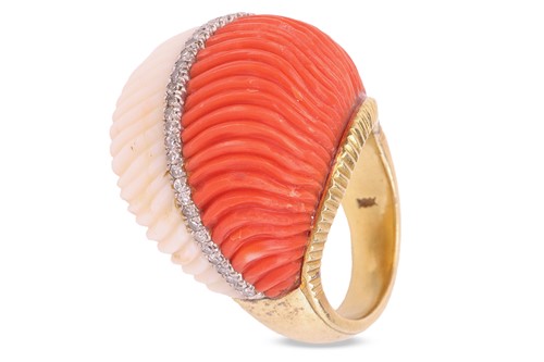 Lot A carved precious coral and diamond cocktail...