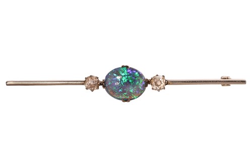 Lot An opal and diamond bar brooch, centred with...