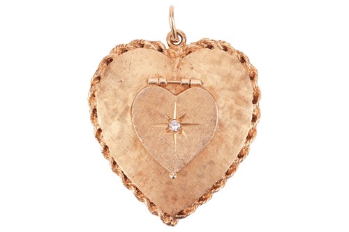 Lot A diamond-set heart locket pendant, comprising...