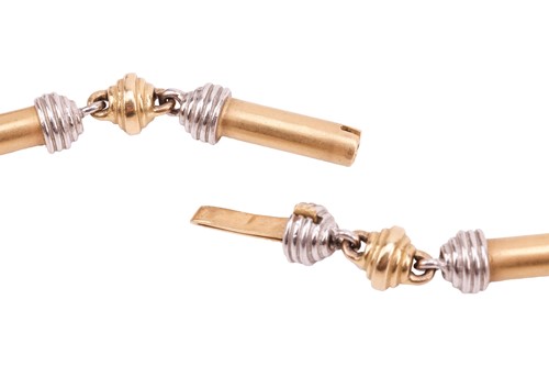 Lot 238 - A two-toned bar link necklace, comprising a...