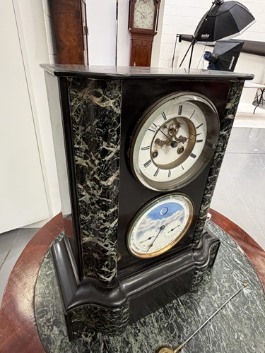 Lot 109 - A French black slate and green variegated...