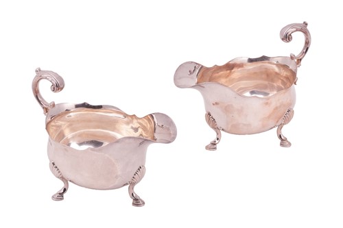 Lot 365 - A pair of silver sauceboats, by Atkin Brothers,...