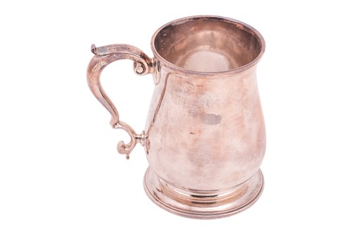 Lot 367 - A George II silver baluster tankard, London...