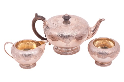 Lot 371 - Garrard - a George IV silver teapot, with...