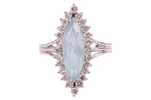 Lot An aquamarine and diamond halo ring in 18ct...