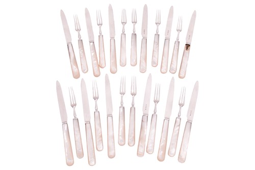 Lot 377 - A set of twelve silver dessert knives and...