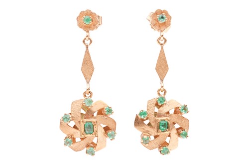 Lot A pair of emerald-set drop earrings, of whorl...