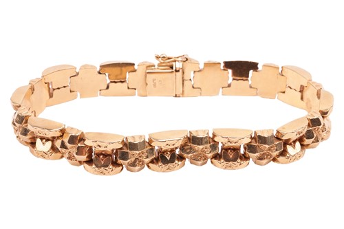 Lot A fancy link bracelet, comprising a series of...
