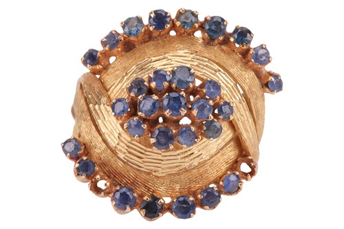 Lot A sapphire-set dress ring, composed of a...