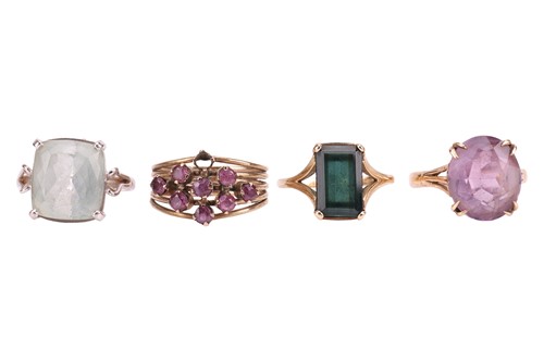 Lot 13 - A group of four gem-set rings; to include a...