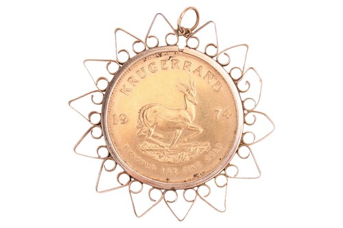 Lot 31 - A Krugerrand in a 9ct gold pendant mount,...