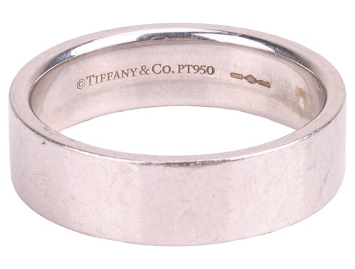Lot 146 - Tiffany & Co. - a wedding band in platinum,...