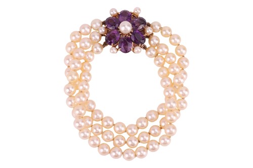 Lot 73 - A cultured pearl bracelet, comprising three...