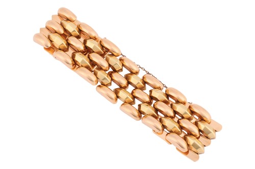 Lot 228 - A panther link bracelet, comprising five rows...
