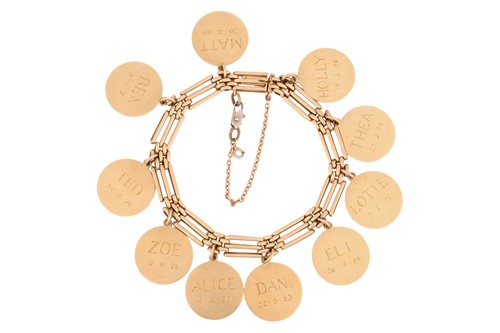 Lot 51 - A gate link bracelet suspending ten circular...