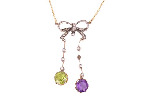 Lot 209 - A Suffragette negligee necklace, the bow motif...