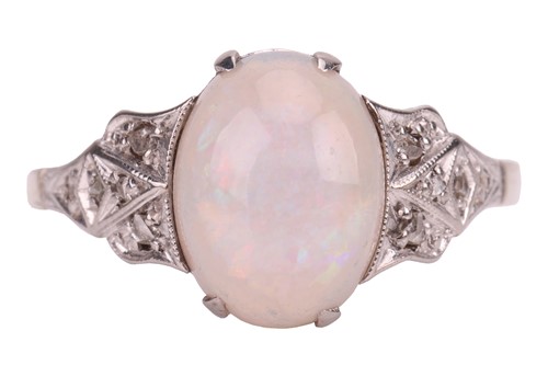 Lot 14 - An opal dress ring, centred with an oval...