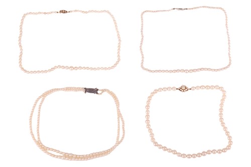Lot 36 - Four cultured pearl necklaces; including two...