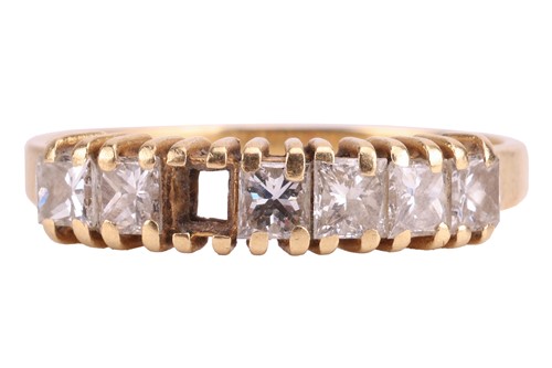 Lot 218 - A diamond half hoop ring in 18ct yellow gold,...
