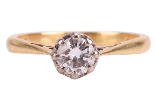 Lot 8 - A diamond solitaire ring in 18ct gold, centred...