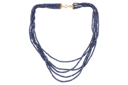 Lot 188 - A sapphire bead necklace, comprising five rows...