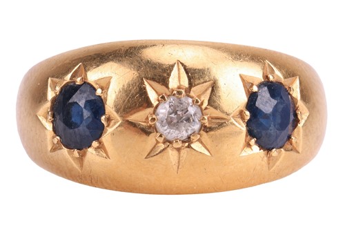 Lot 2 - A diamond and sapphire gypsy ring in 18ct gold,...