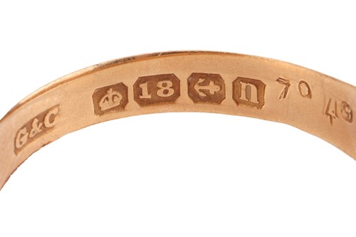 Lot 2 - A diamond and sapphire gypsy ring in 18ct gold,...