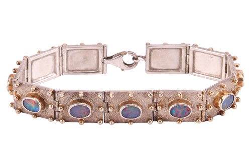 Lot 217 - A silver link bracelet set with black opal...