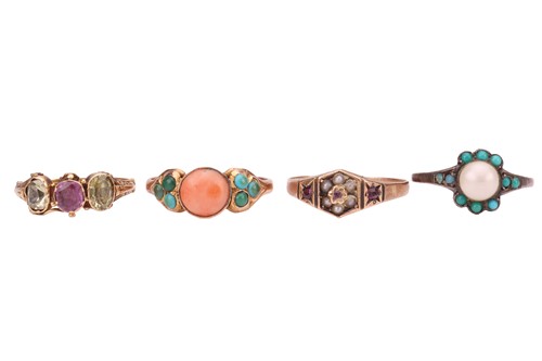 Lot 118 - A group of four gem-set dress rings; including...